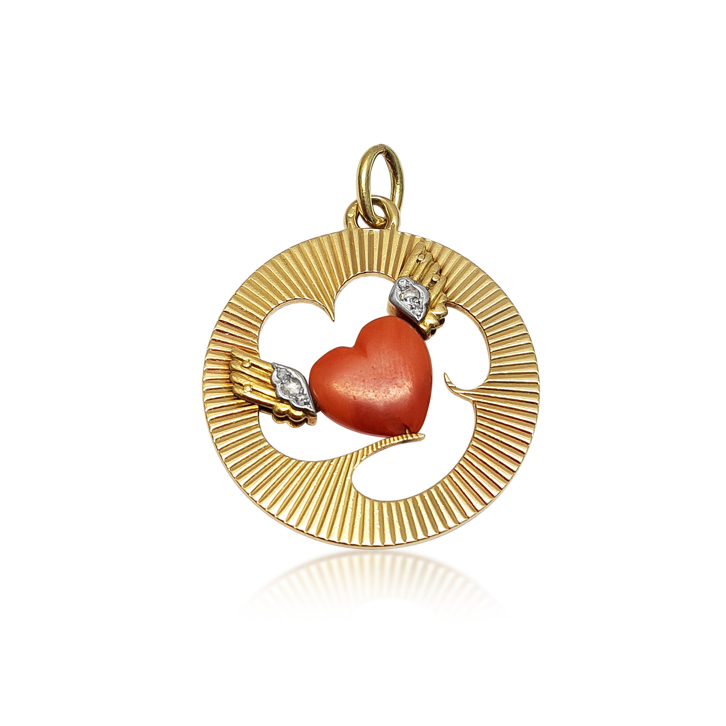 An 18K Yellow Gold Coral Heart and Diamond Pendant Charm, by